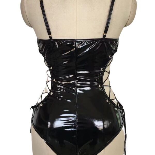 Genuine leather sm costume set featuring a tight-fitting bodice with lace-up detailing, perfect for role play and bondage out...