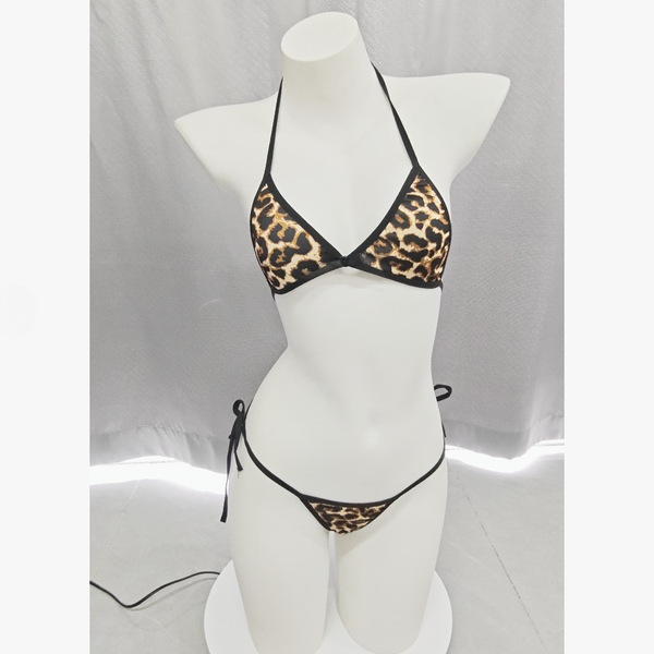 Leopard print bikini set featuring adjustable tie-front design, perfect for curvy women seeking stylish and sexy lingerie.