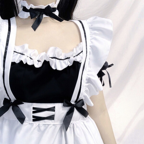 Japanese black and white maid dress with ruffled sleeves and corset detail, perfect for lolita cosplay outfits.