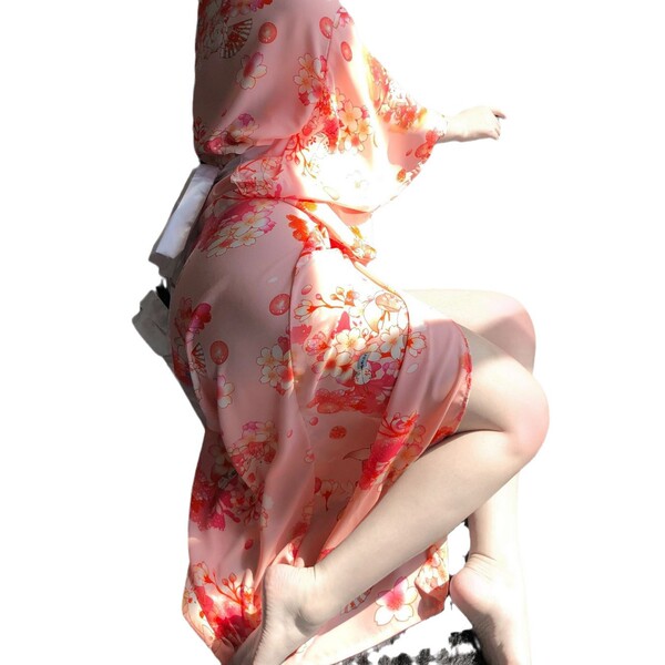 Elegant long sheer sleepwear featuring a floral pattern, perfect for women seeking comfort and style with a touch of elegance...