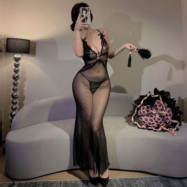Seductive sheer lace lingerie set featuring a sexy mesh bodysuit and long sheer skirt, perfect for women seeking elegance and...