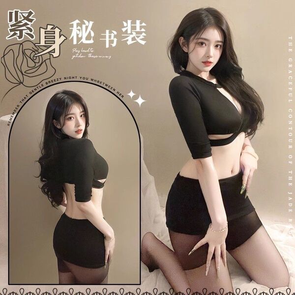 Woman modeling a black long-sleeve secretary costume set featuring a cropped bodysuit and bodycon mini skirt with sheer tight...