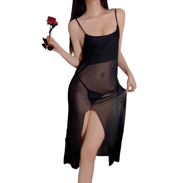 Woman wearing a black sheer mesh slip dress with a high split, holding a red rose.