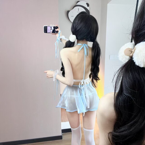 Woman wearing machu chu maid costume set, a cute sheer lingerie outfit with blue ribbons and white knee-high socks.