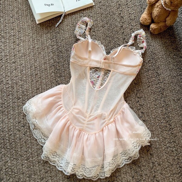 Seductive sheer maid costume with lace details, perfect for date night or romantic evening outfits.