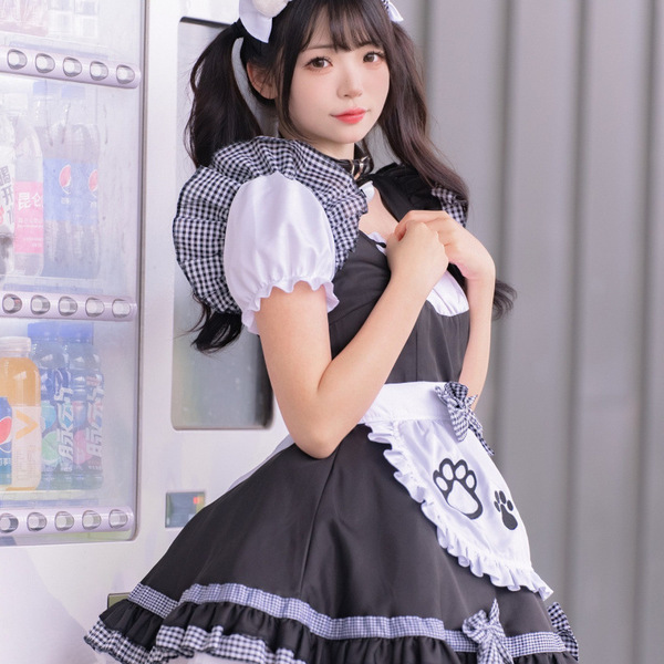 A woman wearing a maid cosplay dress featuring a black and white checkered design with paws on the apron, perfect for anime c...