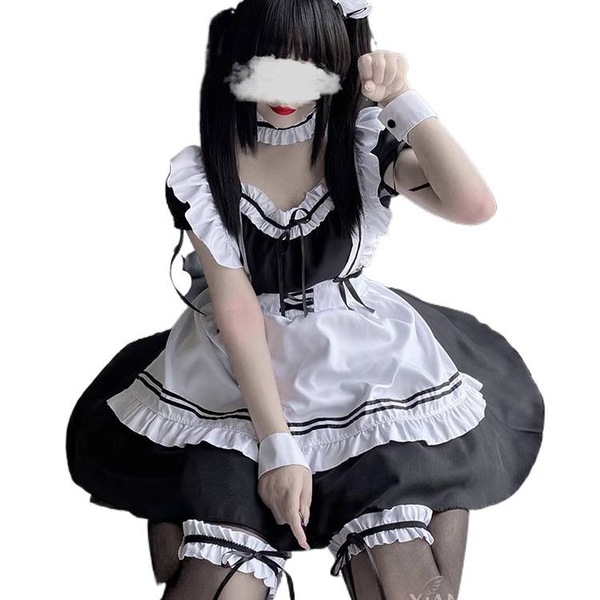 A woman wearing a maid costume cosplay dress, featuring black and white colors with ruffles and apron details, perfect for an...