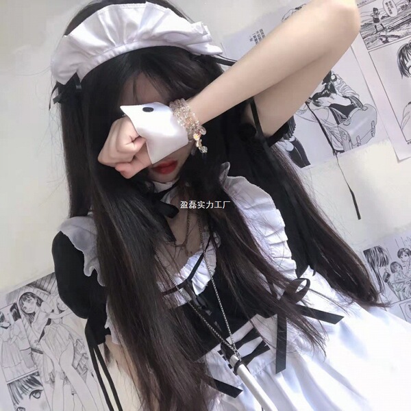 A woman wearing a maid costume cosplay outfit, featuring a cute anime lolita dress with white apron and headband, perfect for...