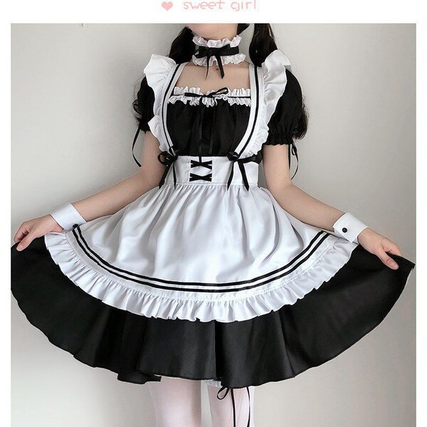 Sweet girl maid costume featuring a cute french maid dress with a black and white design, including a petticoat and accessori...