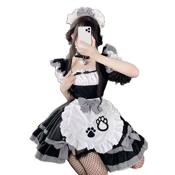 A girl wearing a maid lolita dress, featuring a black and white checkered design with a cute cat ear headband, along with a m...