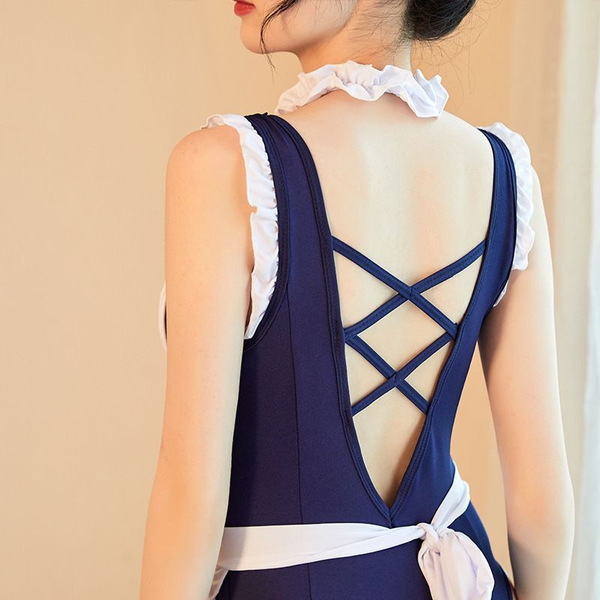Back view of manny night sexy maid bodysuit with ruffled collar, crisscross straps, and white sash tie.