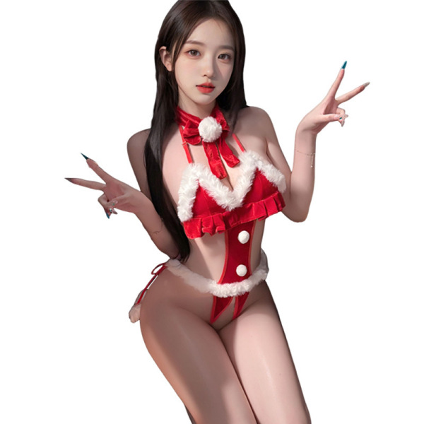 Woman wearing red mannyan christmas velvet bodysuit set with halter tie, plush trim, and open-crotch design.