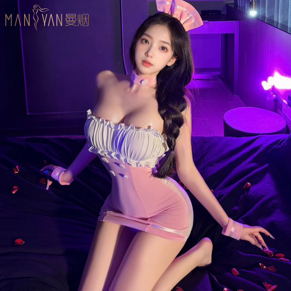 Woman wearing mannyan sexy lace trim mesh bodysuit - sheer sweetheart airline uniform dress in purple-lit room with rose peta...
