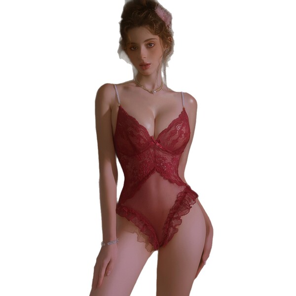 Woman wearing red lace bodysuit with beaded straps and ruffled trim, featuring open-crotch design.