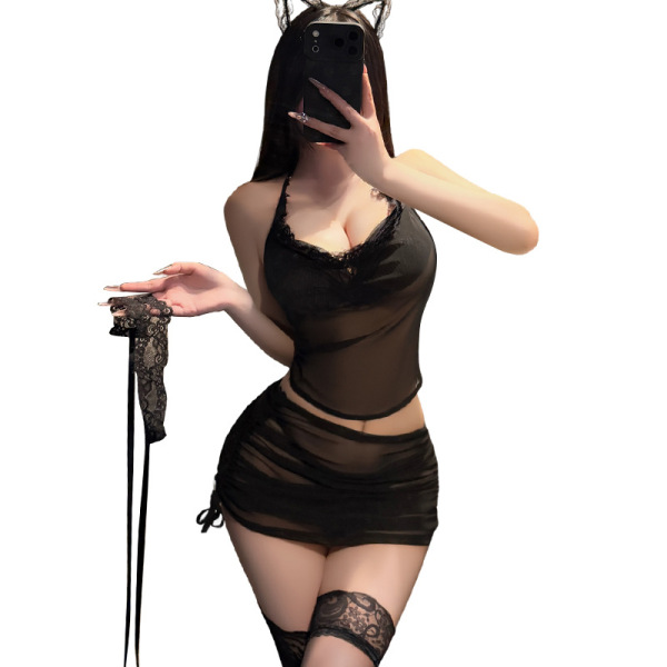 Woman wearing black sheer mannyan sexy lingerie set with halter top, ruffled wrap skirt, lace garters, and cat ears.