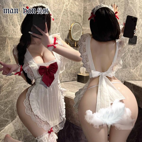 Woman modeling mannyan sexy maid costume set with sheer low-cut top, red bow, thong & detachable skirt for roleplay.