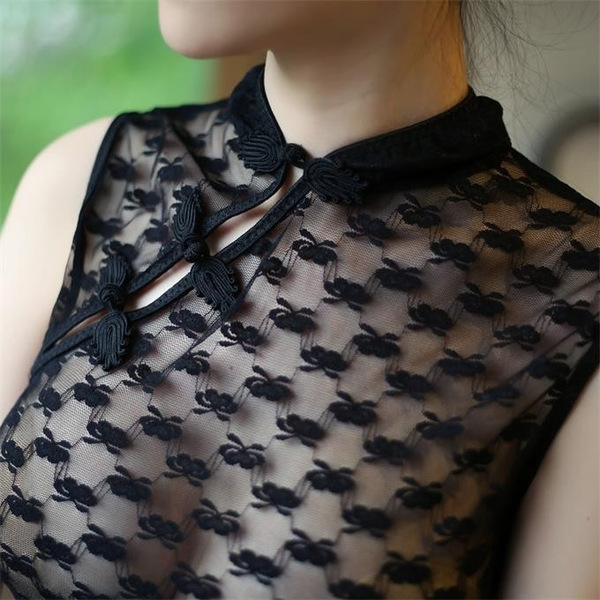 Elegant black lace sheer cheongsam dress featuring floral trim and traditional knot buttons, perfect for classic chinese eleg...