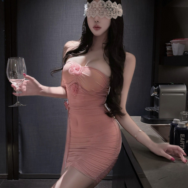Elegant woman wearing mannyqing pure-yu rose mesh bodycon dress, featuring floral design and sheer lace details, perfect for ...