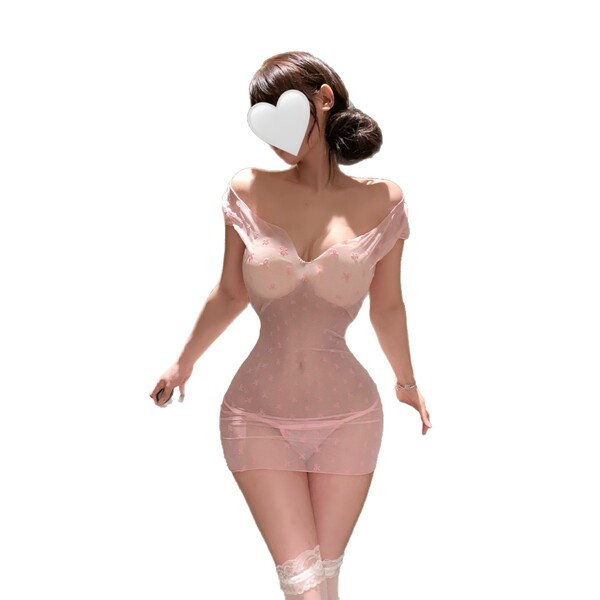 Woman wearing pink sheer lace lingerie set with matching stockings, featuring off-shoulder design and floral details.