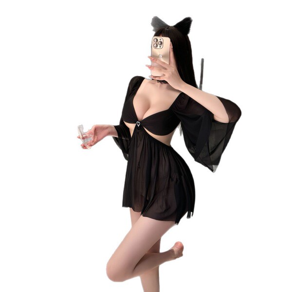 A woman poses with a phone, wearing a black night dress featuring sheer lace details and an open-crotch design, perfect for s...