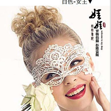 Woman wearing a white lace blindfold and cat mask, part of the nightclub queen lingerie set - sexy party outfit for women.