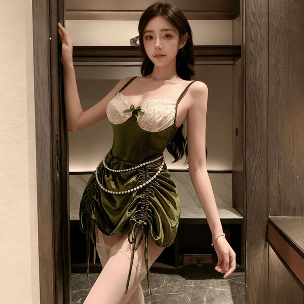 A woman poses in a nightgown featuring french-style lace and velvet, perfect for romantic new year celebrations.