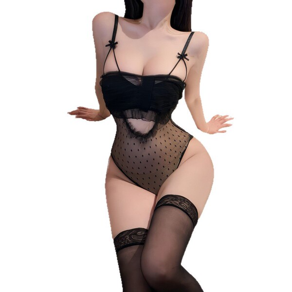 Woman wearing black sheer mesh nightsigh lace bodysuit with cut-out details and open-crotch design, paired with lace-top stoc...