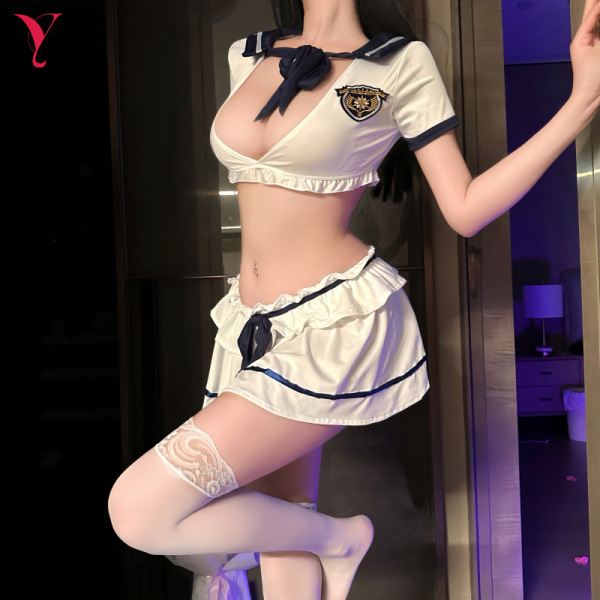 Woman modeling nightsiren sweet-spicy sailor uniform set with mini skirt, lace thigh-highs, and navy trim.