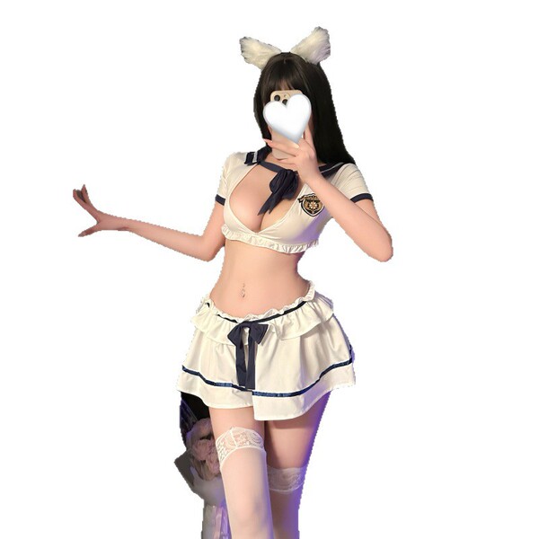 Woman modeling nightsiren sweet-spicy sailor uniform set with mini skirt, crop top, bow tie, cat ears, and thigh-highs.