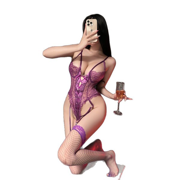 Woman in purple lace sleepwear set taking selfie with phone and wine glass. nightsiyese stylish matching pajama set.