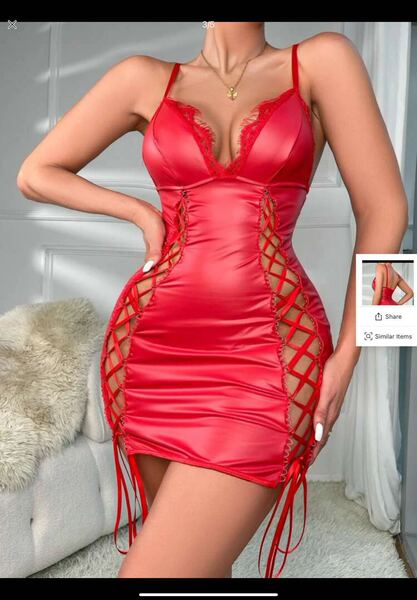 Woman wearing a red ol secretary lingerie set with lace-up sides and pencil skirt, perfect for summer cosplay or sleepwear.