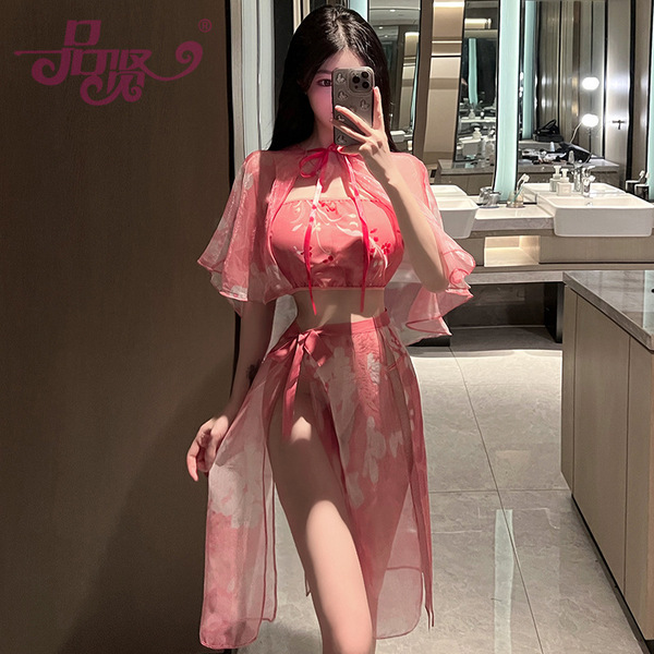A woman models a pinxian original chinese-inspired lingerie set featuring a cherry blossom design, perfect for role play slee...
