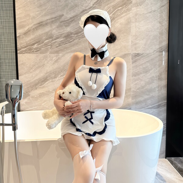 Sexy maid costume with white dress and bow tie, holding a teddy bear, perfect for bedroom play outfits.