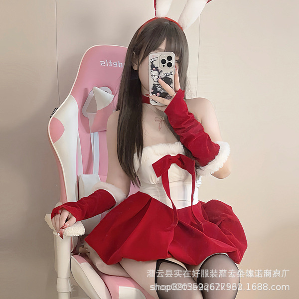 A person wearing a festive red and white christmas bodysuit with bunny ears, perfect for holiday cosplay.