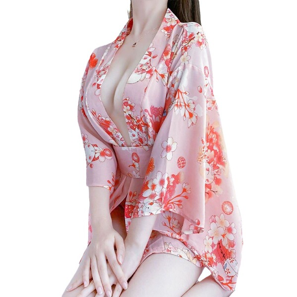 A woman wears a plus-size japanese kimono with a floral print, featuring a deep v-neckline and flowing design, perfect for se...