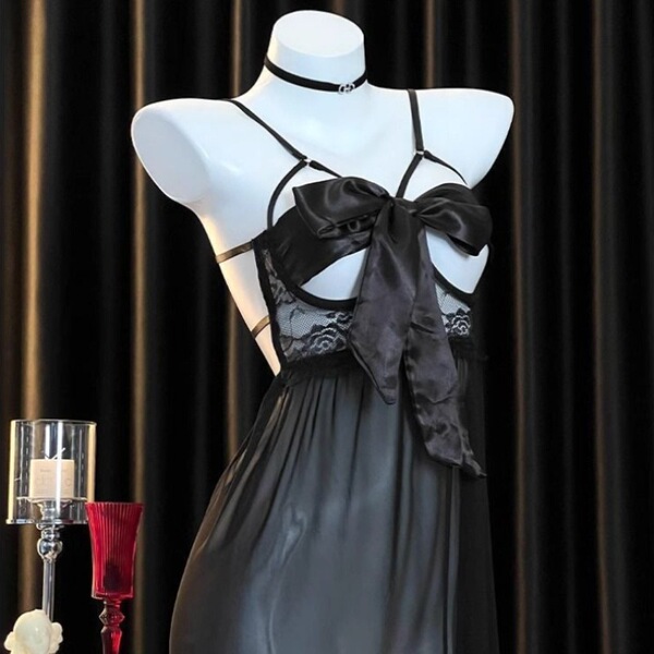 Black plus size lace chemise set with satin bow and ties, sexy bedroom-ready sleepwear on mannequin.