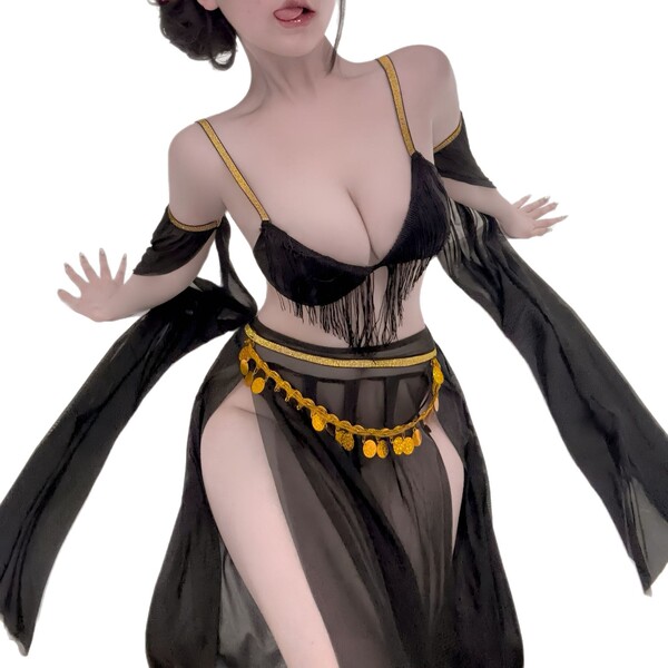 Woman wearing a black plus size sensual lingerie set with gold accents, featuring a fringed bra and sheer skirt.