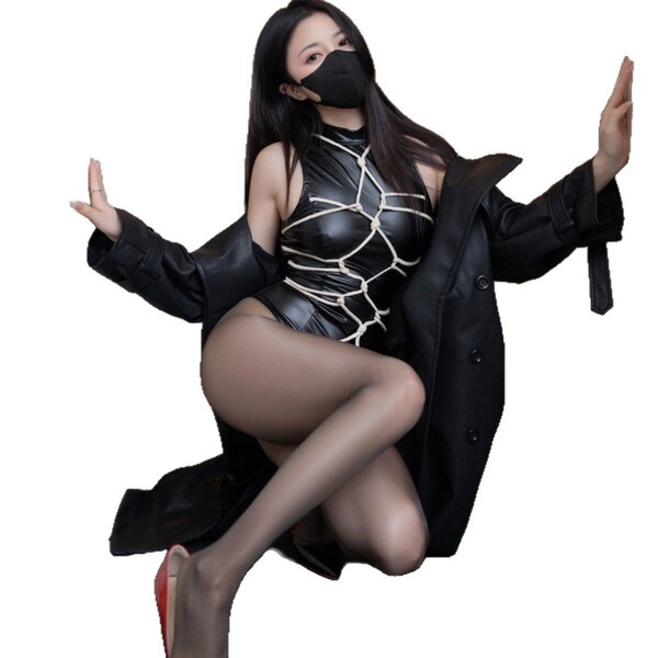 Sexy bondage bodysuit with leather design, black outfit featuring intricate patterns, perfect for women seeking an edgy look.