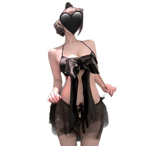 Woman wearing a black sheer mesh sleep dress with an open-crotch design and bow details.