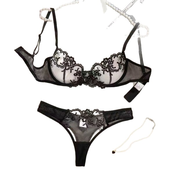 Luxury plus size sexy lingerie set with elegant black lace bra and matching panty, inspired by style.