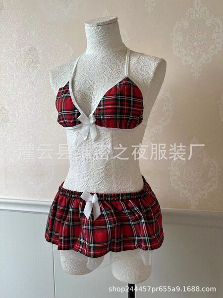Red plaid three-piece lingerie set with white lace trim and bows, displayed on a mannequin.