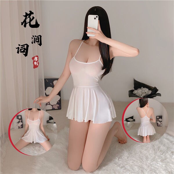 Woman modeling white sheer babydoll nightgown with backless design, featuring silk-look lace and flared skirt.
