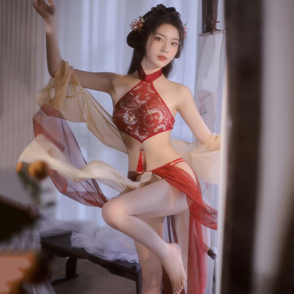 Elegant vintage chinese hanfu set featuring a dunhuang flying phoenix embroidered halter bodice paired with a gauzy skirt, pe...