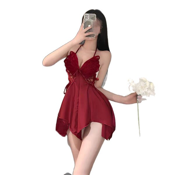 Woman in red butterfly lace sleep dress holding white flowers, showcasing sexy satin slip nightgown for women.