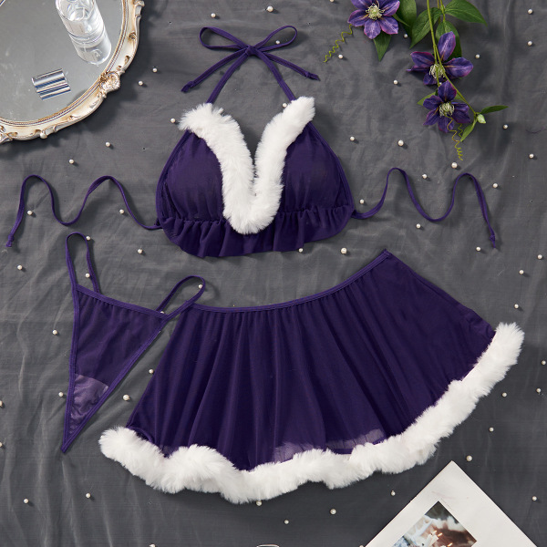 Purple velvet bunny lingerie set with white fur trim, halter top and skirt, styled on gray fabric with pearls and flowers.