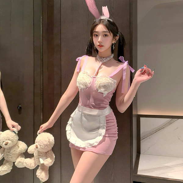 A woman poses in a playful bunny maid costume, featuring a sheer mesh bodice and bunny ears, perfect for role play and flirty...