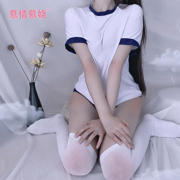 A woman models a white college girl costume with blue trim, featuring a matching bra and thong design, emphasizing a playful ...