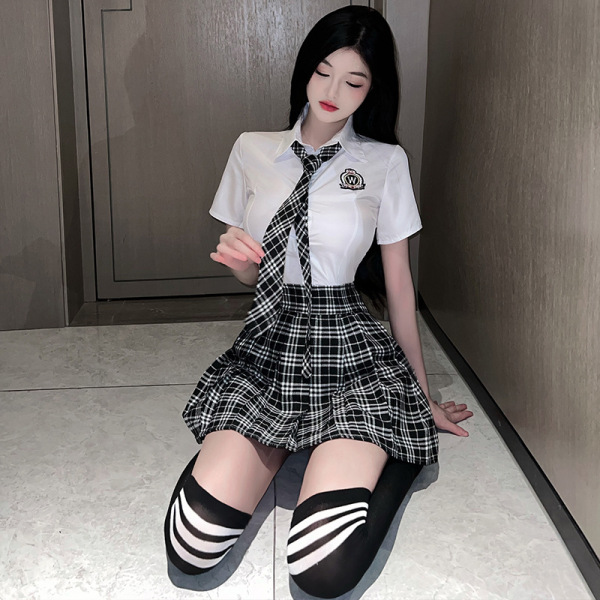 Cute jk style lingerie set featuring a white blouse, plaid skirt, and striped thigh-highs for a playful look.