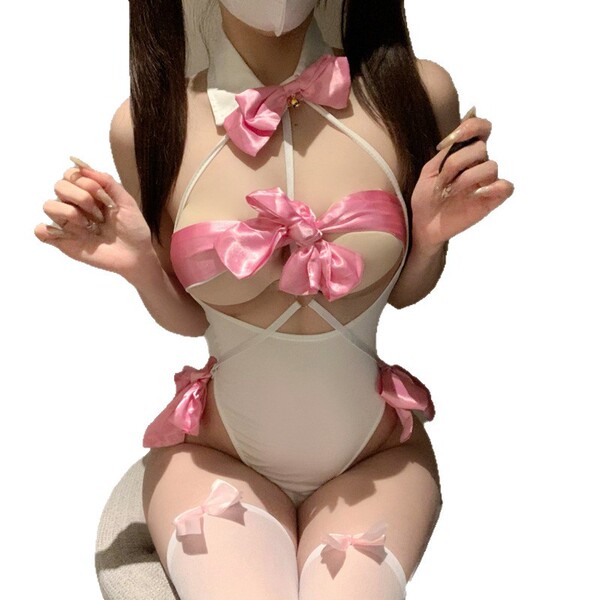 Woman wearing white and pink pure & playful lingerie set with bows, modest yet sexy cosplay sleepwear outfit.