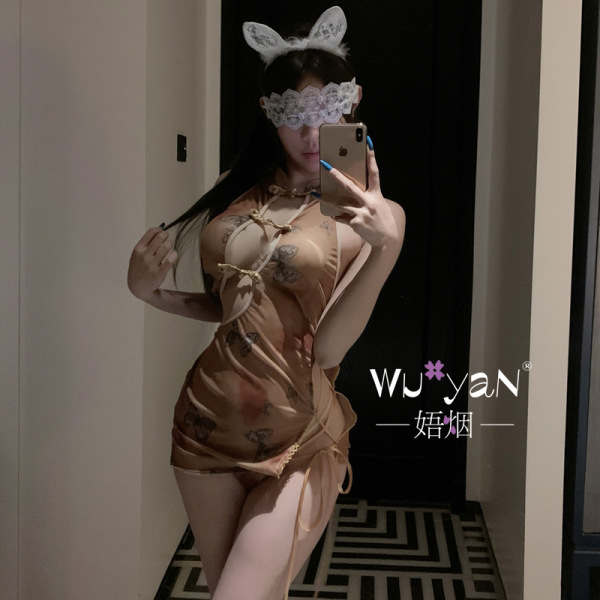 Woman in mirror wearing pure & playful lingerie set - seductive qipao-inspired sleepwear with lace mask and bunny ears, elega...